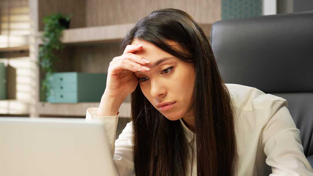 upset-young-lawyer-lost-in preparing a barister's brief